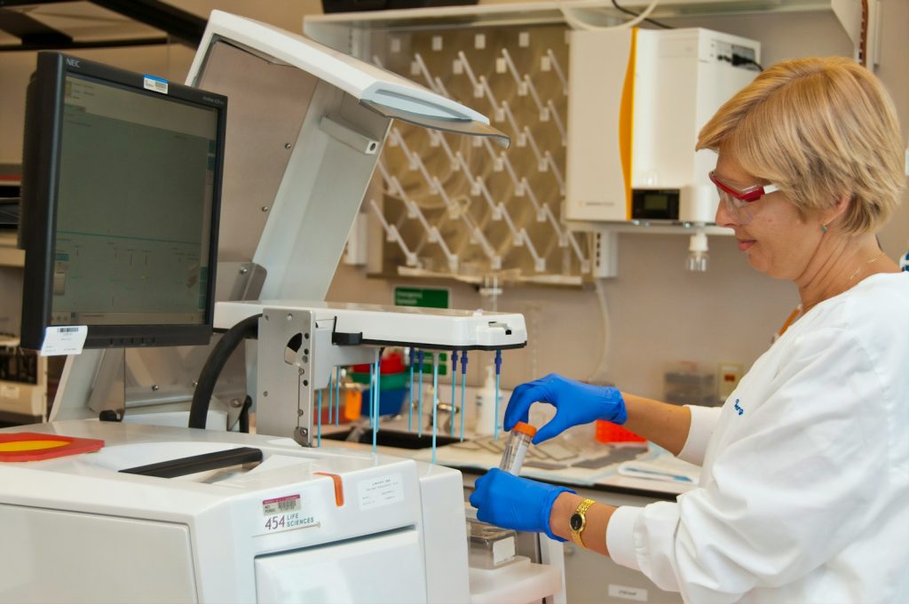 A close-up of a blood sample being analyzed in a laboratory, symbolizing liquid biopsy testing.